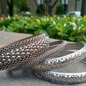 Silver metal bracelets (set of 4)